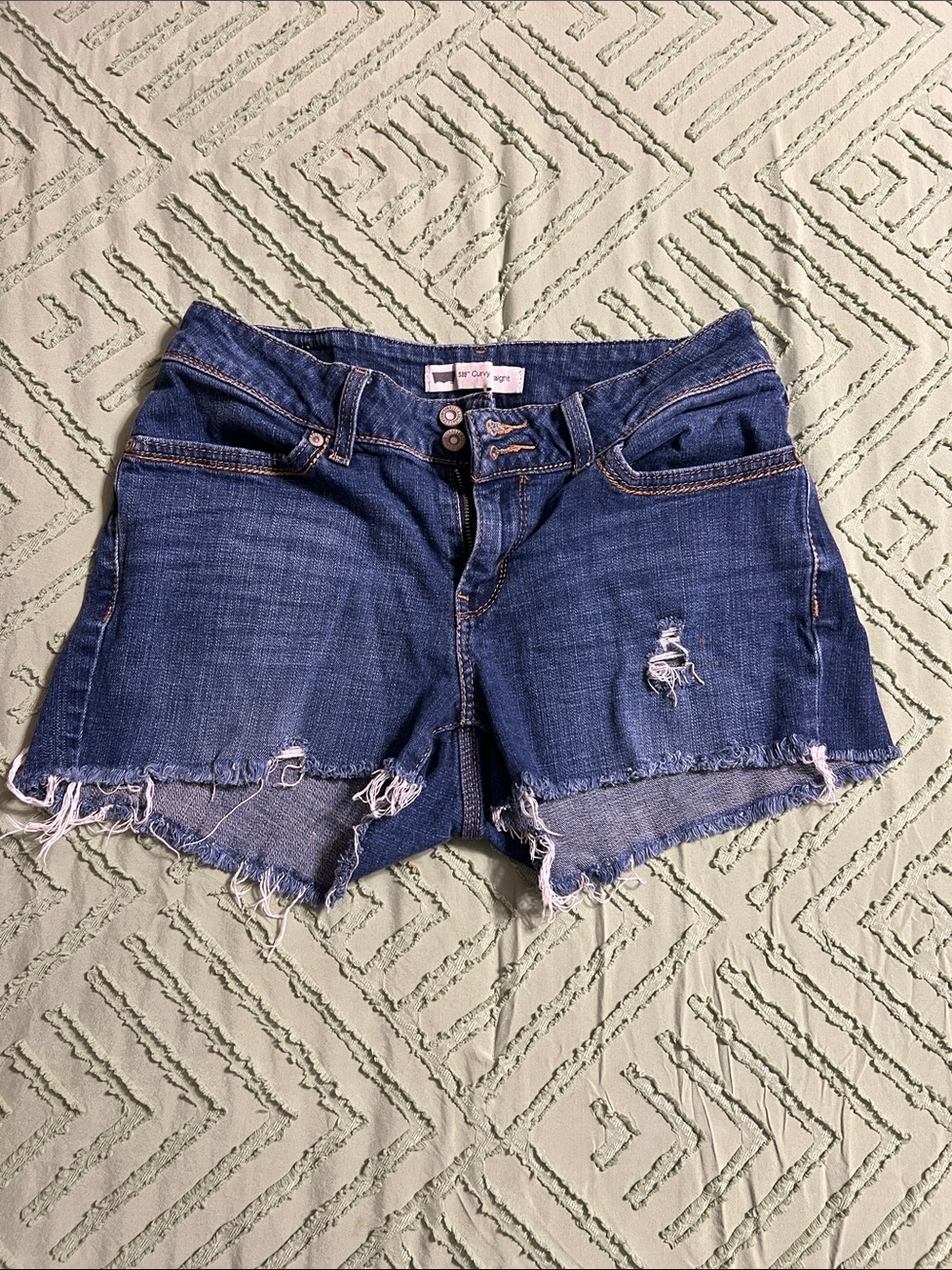Levi's Dark Blue Distressed Denim Cutoff Shorts